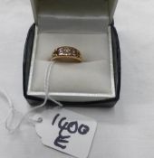 A 9ct gold 3 stone diamond ring, size N,.