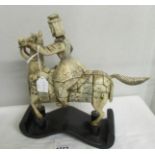 A 19th century carved ivory warrior on horse, a/f.