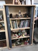 An office storage cupboard with roller doors