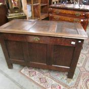 A large antique oak blanket box