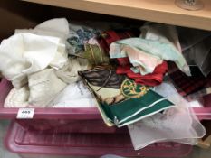 A box of linen & baby clothes (christening dress)