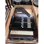 An auto harp with 32 strings