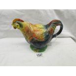 A Staffordshire rooster teapot.