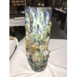 A Japanese pottery vase with applied figural scenes, a/f.