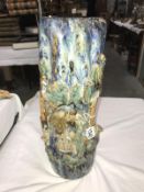A Japanese pottery vase with applied figural scenes, a/f.