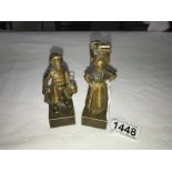 A pair of rare bronze figures of a Fisherman and a Fishwife on bases, Man 10cm and woman 11cm tall.