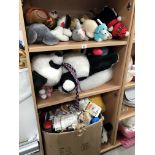 3 shelves of cuddly toys/dolls