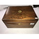 A Victorian mahogany sewing box with contents.