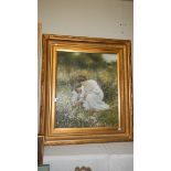 A gilt framed oil on canvas of a mother and child in field of wild flowers signed Dalkof?.