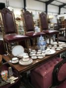 An oak dinner table and 6 chairs