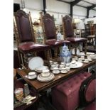 An oak dinner table and 6 chairs