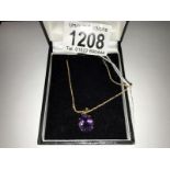 A 9ct gold amethyst set pendant.