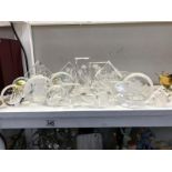 A quantity of etched glass ornaments