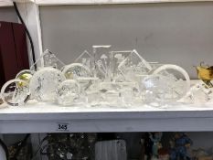 A quantity of etched glass ornaments