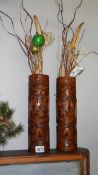 A pair of carved wood vases/brush pots.