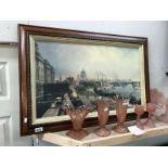 A framed picture of London embankment