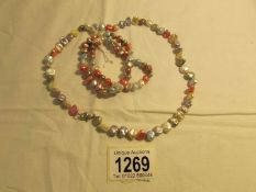 A Honora Keishi pearl necklace and 2 bracelets in wild flower colours.