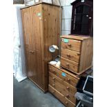 A pine bedroom suite consisting of a wardrobe,