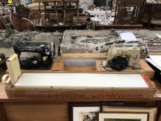 An Alfa Challenge and a Singer sewing machine and a knitting machine