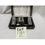 A cased 3 piece silver condiment set.