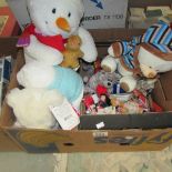 A box of new soft toys, small dolls, pin badges, key fobs etc.