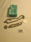 A Tiffany silver necklace and bracelet.