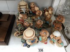 A collection of 12 Pendelfin figurines including Sudsey & Sweep