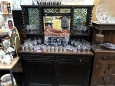 A mirror back sideboard with 3 leaded green "Puntel" panels