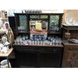 A mirror back sideboard with 3 leaded green "Puntel" panels