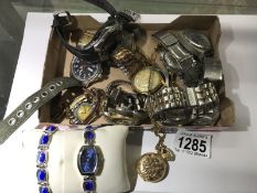 A quantity of ladies and gents wrist watches.