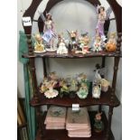 3 shelves of fairy ornaments