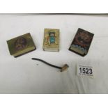 3 matchbox holders and a miniature pipe.