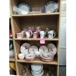 4 shelves of dinnerware & drinking glasses,