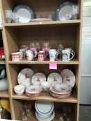 4 shelves of dinnerware & drinking glasses,