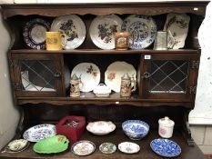 A mixed lot of plates, dishes & tankards etc.