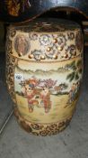 An oriental style pottery stool.