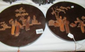 A pair of 19th century Japanese wall plaques.