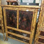 A bamboo cupboard having 2 doors and 2 drawers.