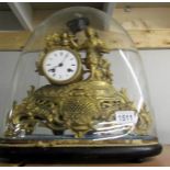 A gilded clock under dome (feather damaged).