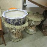 2 garden urns and other garden items.