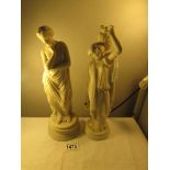 2 Grecian style figurines.