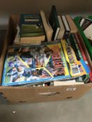 A box of books on sport