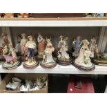 A collection of Leonardo figurines including Mischief & Wine Lovers etc.