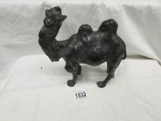 A spelter figure of a camel.