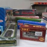 A mixed lot of '00' gauge locomotives and rolling stock by Replica Railways, Bachmann, Hornby etc.
