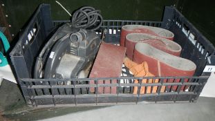 An Elu belt sander with belts,