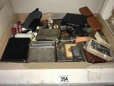 A large quantity of cigarette cases & lighters etc.