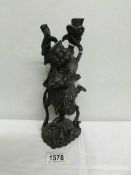 A carved wood Chinese figure, a/f (crack to base).