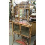 A bamboo corner cabinet.