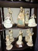 2 shelves of biscuit porcelain lady figurines
